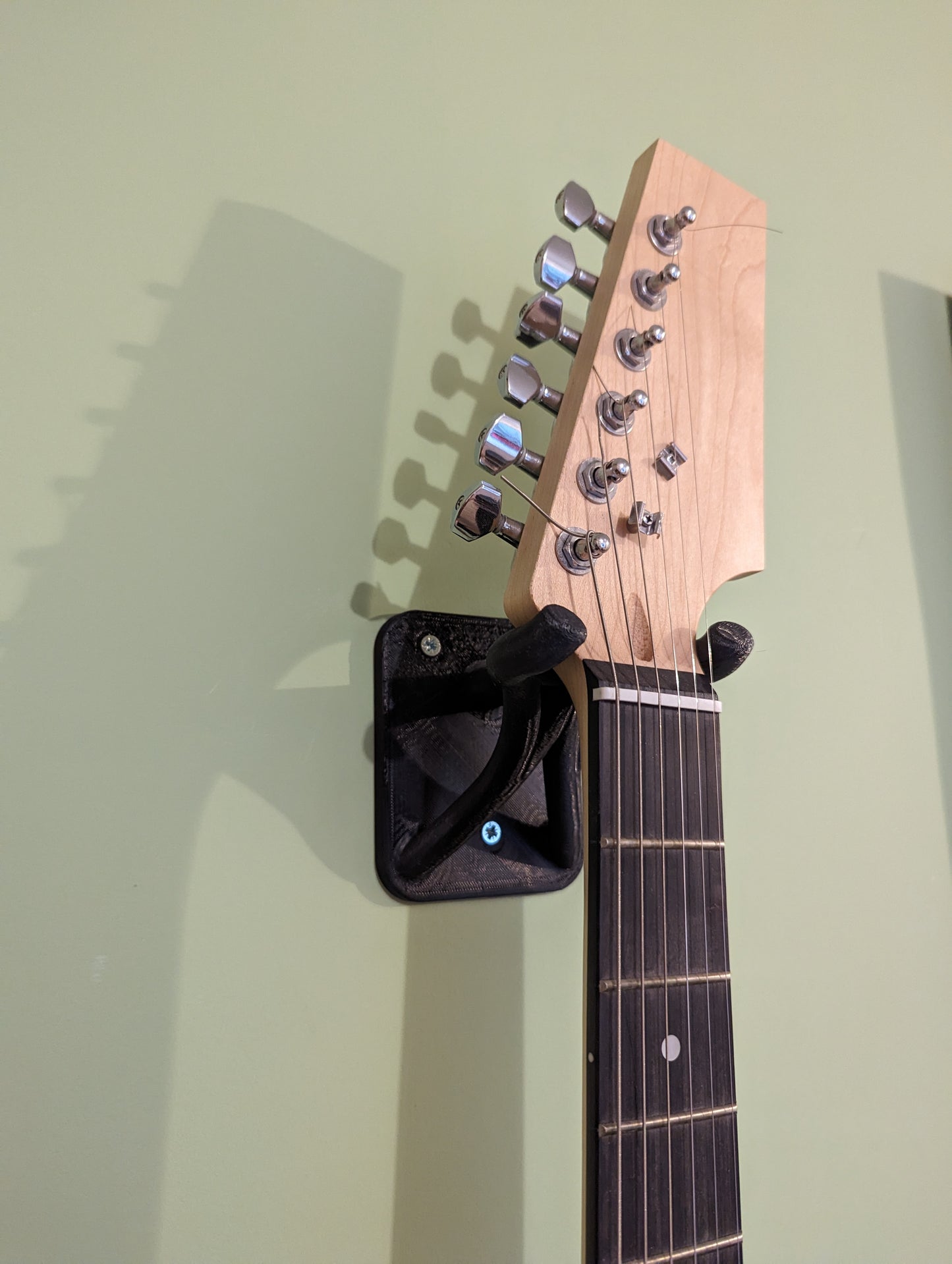 Support mural pour guitare