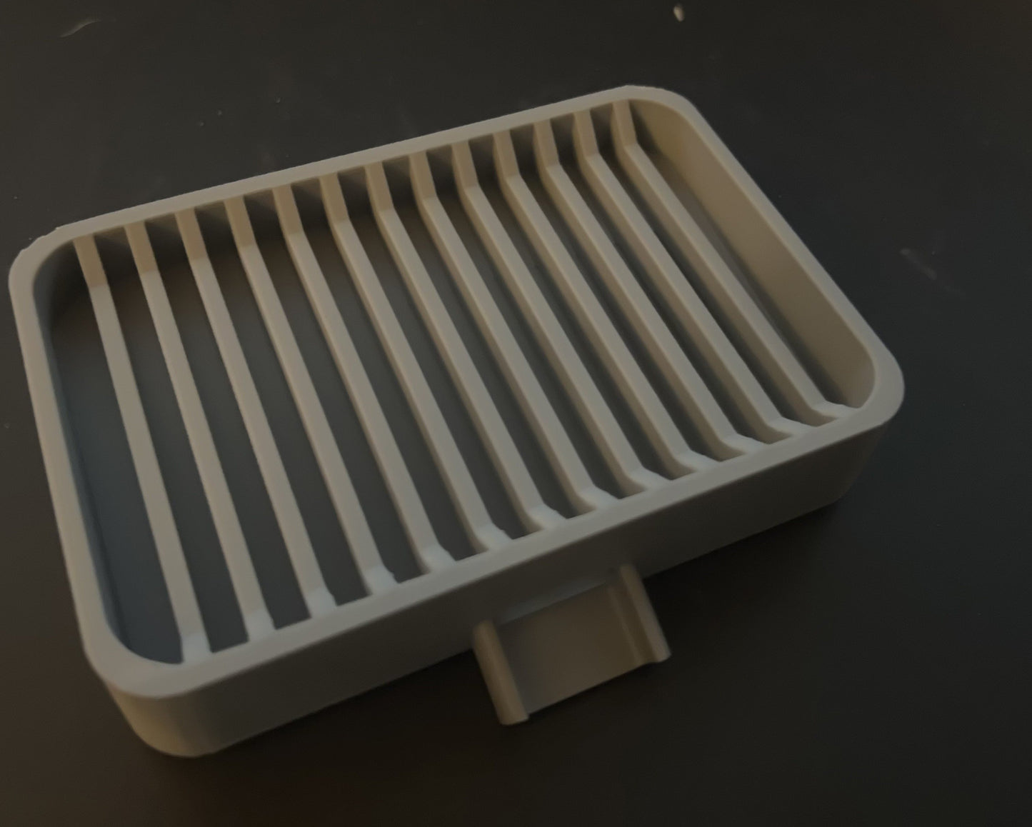 Porte savon/éponges qui se draine tout seul