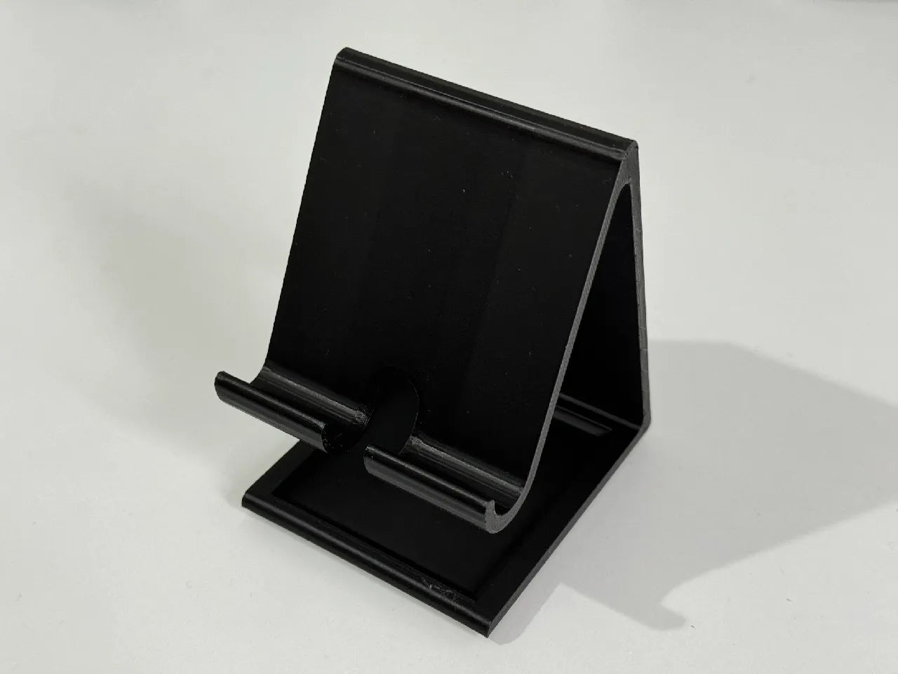 Support de téléphone surelevé