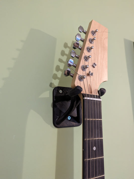 Support mural pour guitare